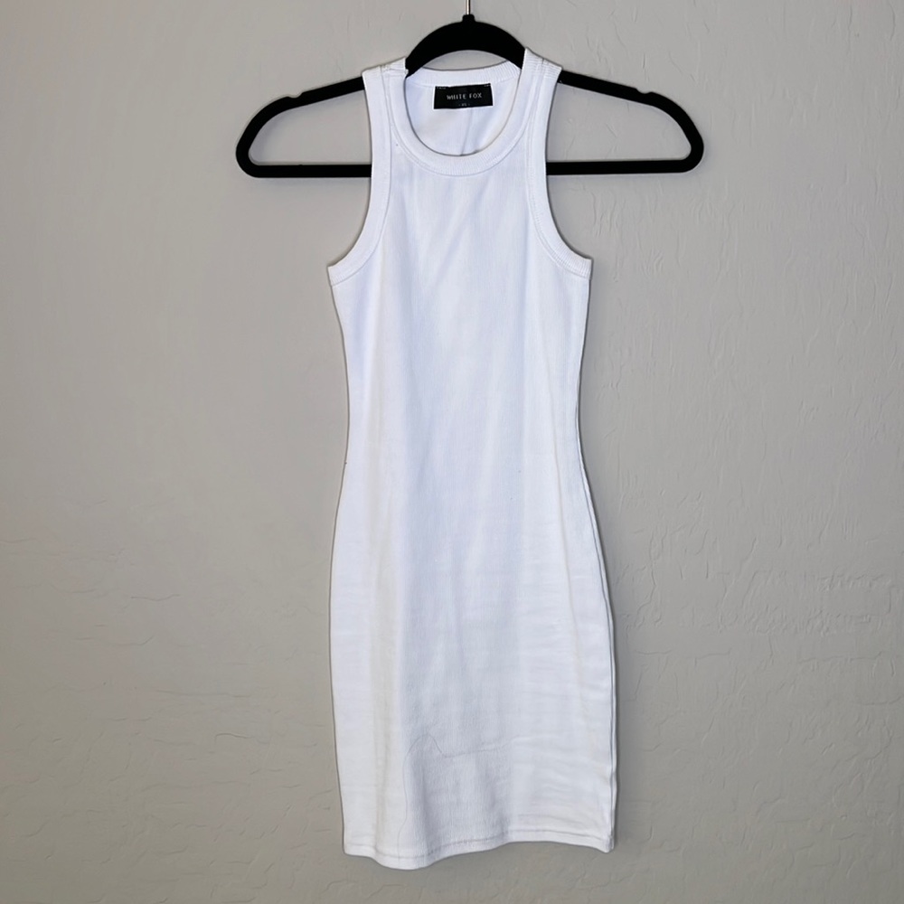 White fox dress size XS. Lightly worn.